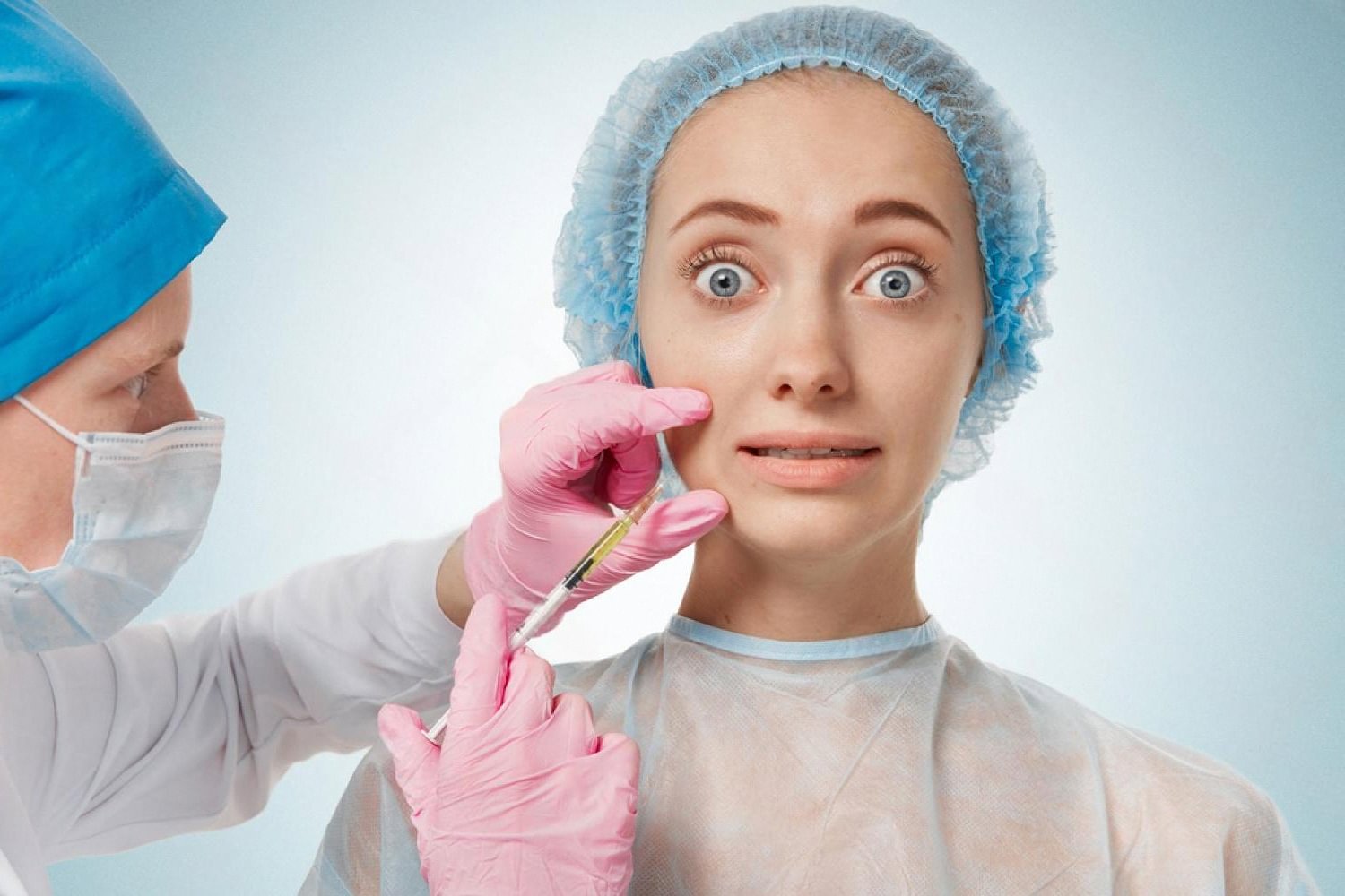 Nervous young woman receiving her first Botox injection at a UAE cosmetology clinic